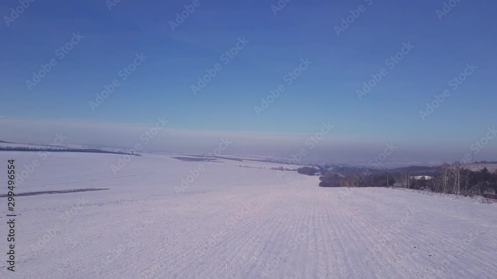 Aerial or top view from a drone on a highway in winter weather Aerial or top view from a drone on a highway in winter weather