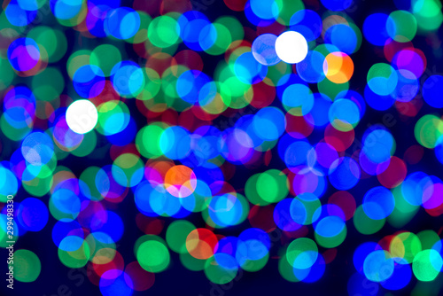 Green blue red bokeh lights of Christmas lights and New year