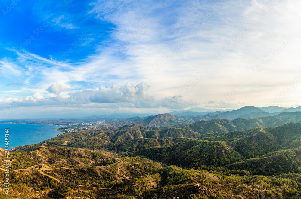 Troodos mountains panorama with Lefke town at the sea coast afar, North Cyprus