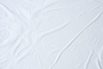 Blank white crumpled and creased paper poster texture background