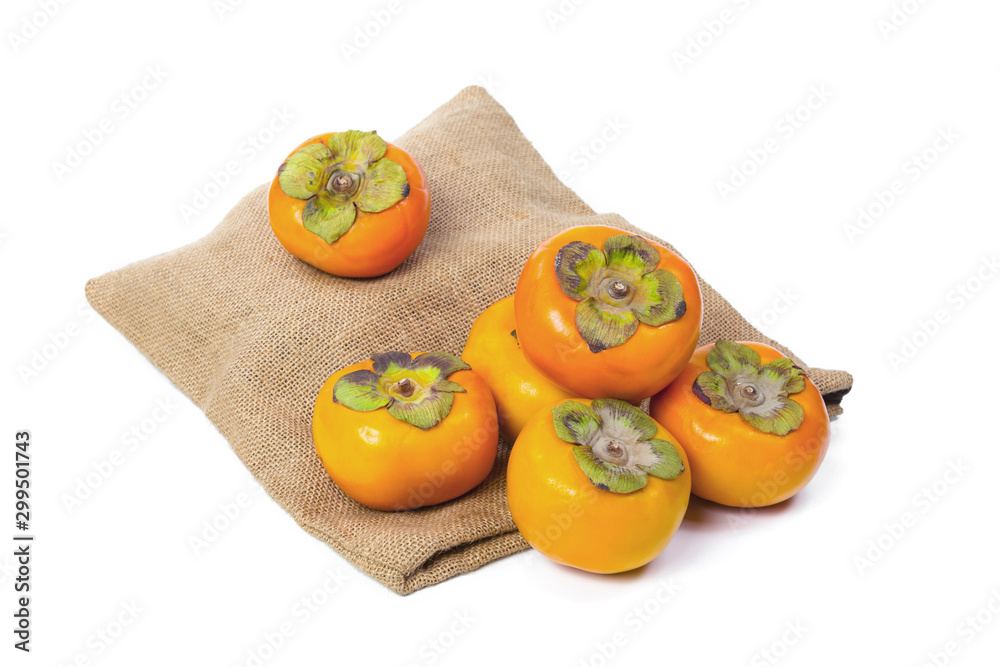 Persimmon with sack isolated on white background Persimmon with sack isolated on white background
