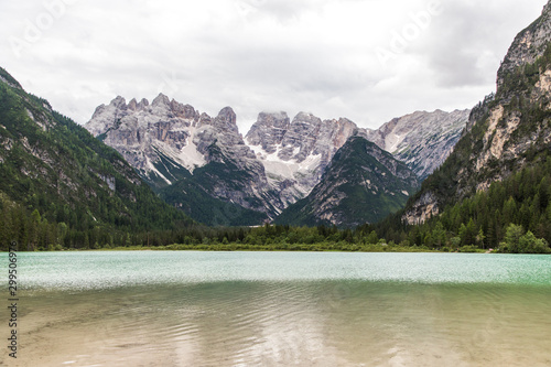 Dolomites, Italy - July, 2019: Big majestic mountains, view of Lake Landro Lago di Landro Cristallo group the Dolomites, Italy