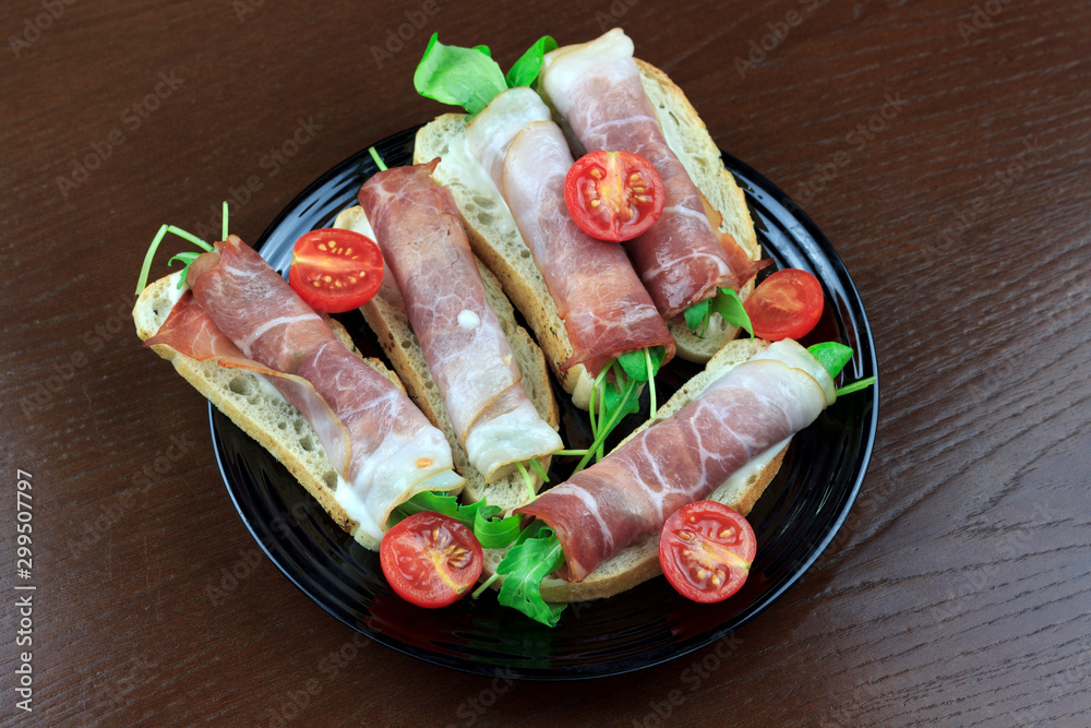 sandwich with bacon and herbs with cherry tomatoes sandwich with bacon and herbs with cherry tomatoes