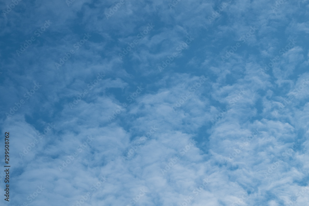 Sky with clouds. Background of blue sky with clouds. Fluffy clouds on a blue sky. Sky with clouds. Background of blue sky with clouds. Fluffy clouds on a blue sky.