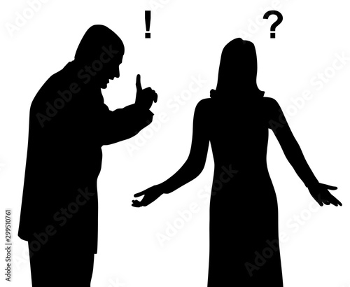 Annoyed outraged man yelling and blaming a puzzled confused woman who is spreading her hands in gesture of asking question why. Misunderstanding  in relationship. Man shouting and threatening woman.