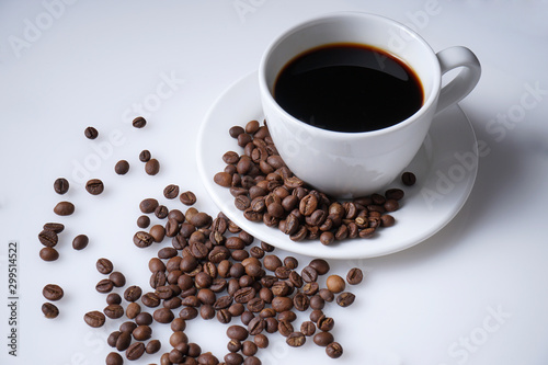 cup of coffee and coffee beans with space
