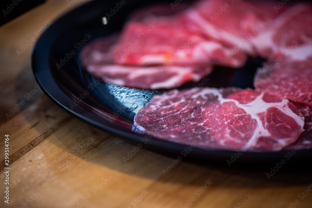 Shabu-shabu is a Japanese nabemono hotpot dish of thinly sliced meat and vegetables boiled in water. The term is onomatopoeic, derived from the sound emitted when the ingredients are stirred Shabu-shabu is a Japanese nabemono hotpot dish of thinly sliced meat and vegetables boiled in water. The term is onomatopoeic, derived from the sound emitted when the ingredients are stirred