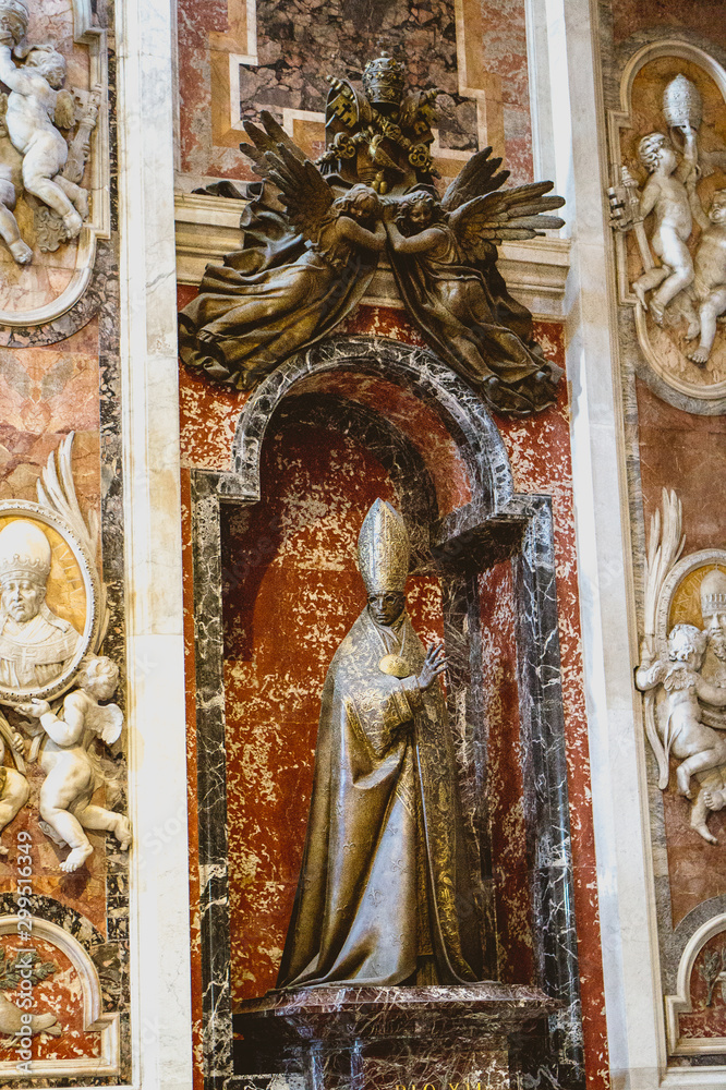 Statue of a Pope located inside the Basilica of St. Peter in Rome
