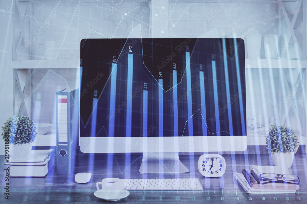 Forex graph hologram on table with computer background. Double exposure. Concept of financial markets. Forex graph hologram on table with computer background. Double exposure. Concept of financial markets.