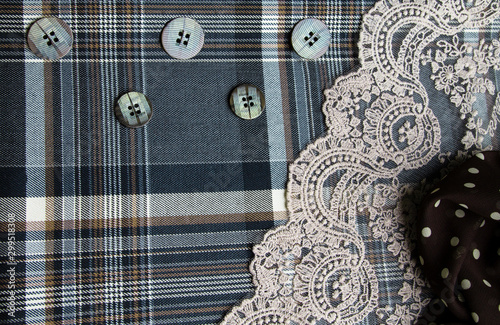 striped fabric with buttons and lace photo