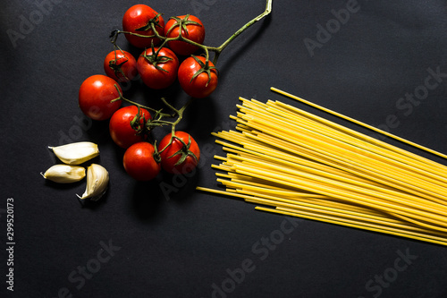 pasta ingredients isolated on black background