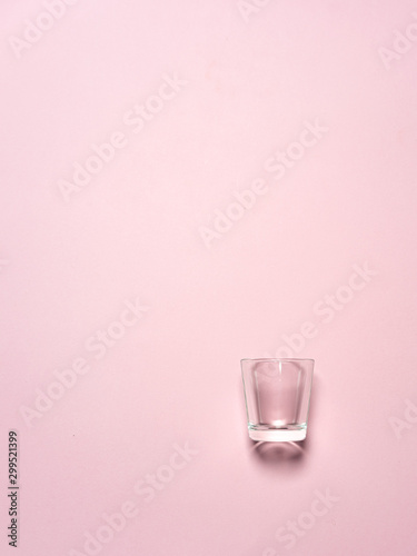 empty wine glass isolated on pink background