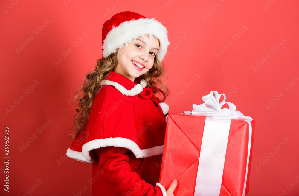Happy new year concept. Unpacking christmas gift. Winter holiday tradition. Opening christmas gift. Kid happy with christmas present. Dreams come true. Girl celebrate christmas open gift box Happy new year concept. Unpacking christmas gift. Winter holiday tradition. Opening christmas gift. Kid happy with christmas present. Dreams come true. Girl celebrate christmas open gift box