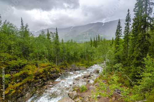 Waterfall on Risjok river in Khibiny Mountains, Kola Peninsula, Russia photo