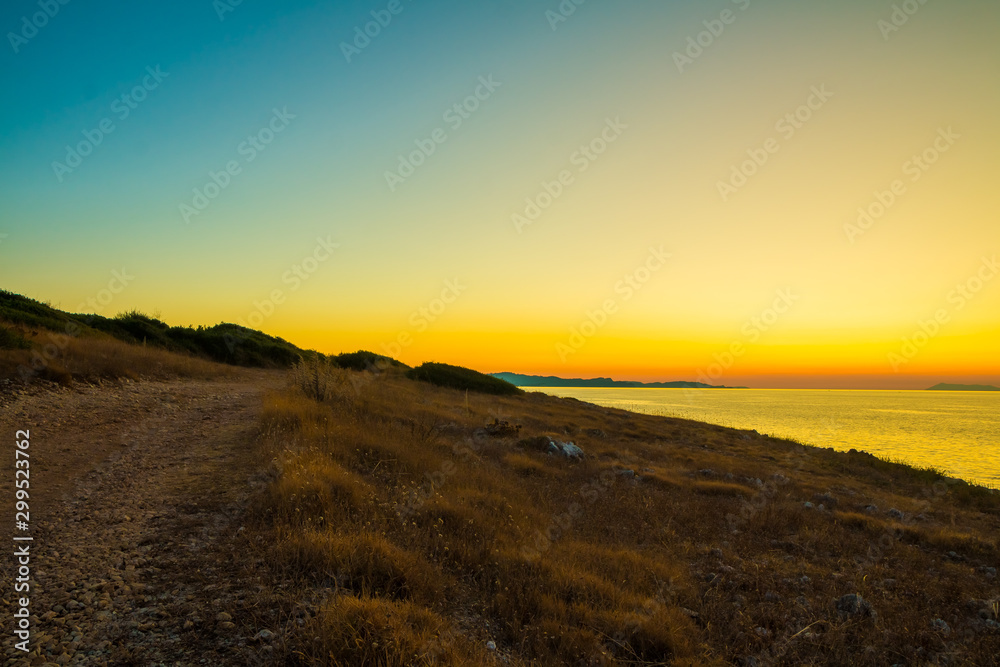 Sunset at Antinioti West Beach in Corfu Island