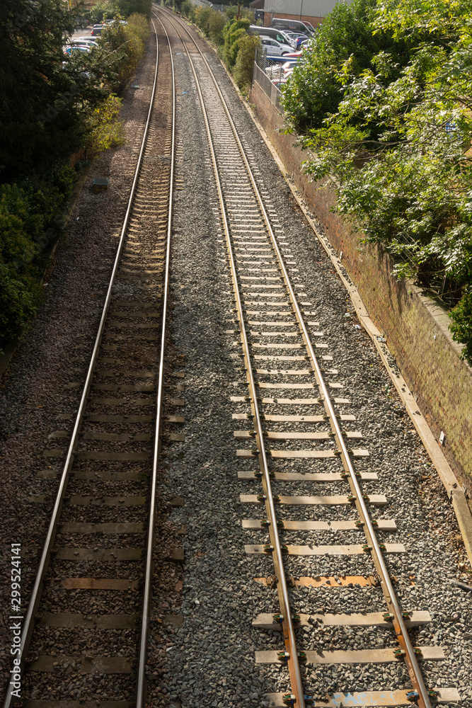 An image of a rail way to the misty horizon