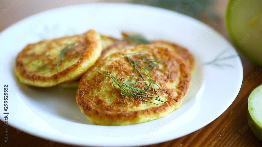 vegetable fritters made from green zucchini in a plate vegetable fritters made from green zucchini in a plate