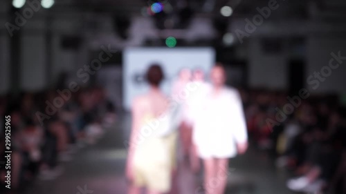 models on the catwalk in defocus. fashion Week photo