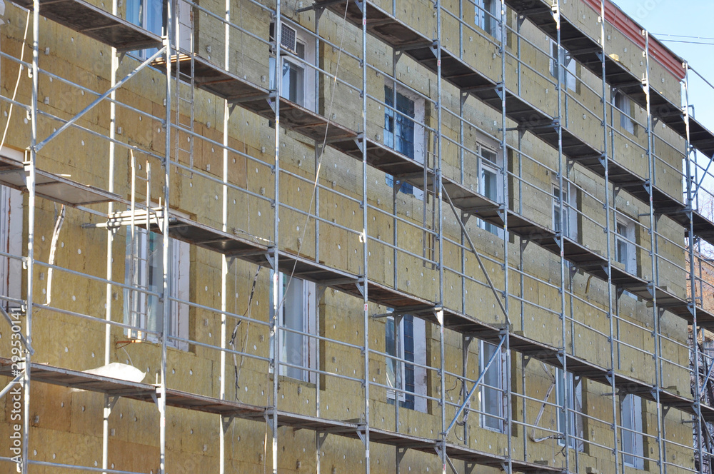 Office building renovation with rock wool insulation. External Wall Insulation with Fiber glass. Office building renovation with rock wool insulation. External Wall Insulation with Fiber glass.