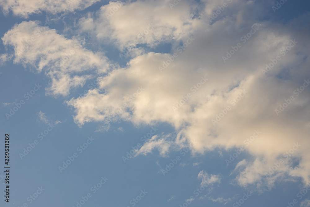 fluffy clouds and sky background