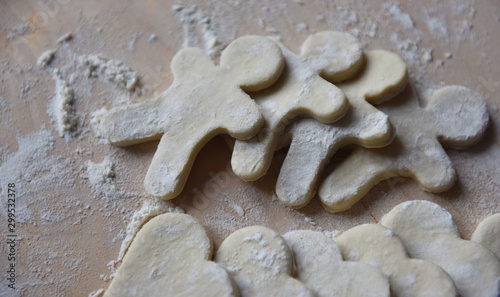 making Christmas cookies from dough