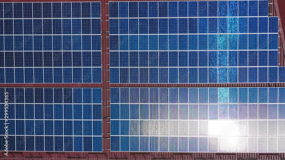 Solar panels from above. Aerial drone view of solar panels on the roof of building Solar panels from above. Aerial drone view of solar panels on the roof of building