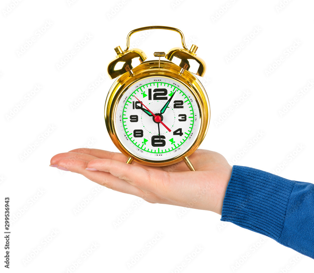 Hand with alarm clock Hand with alarm clock