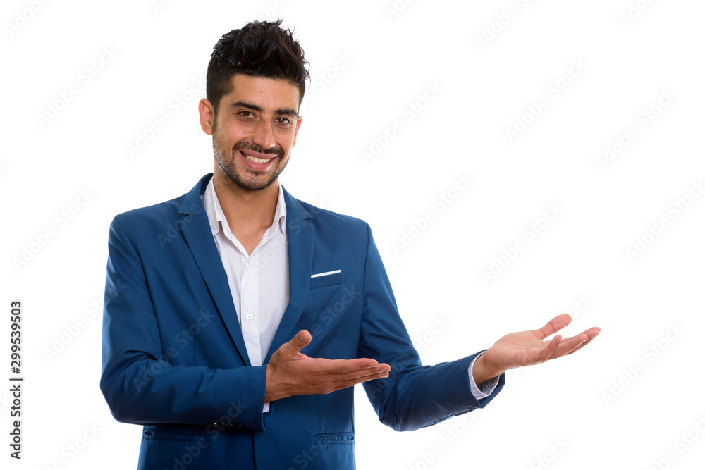 Young handsome bearded Persian businessman in suit Young handsome bearded Persian businessman in suit
