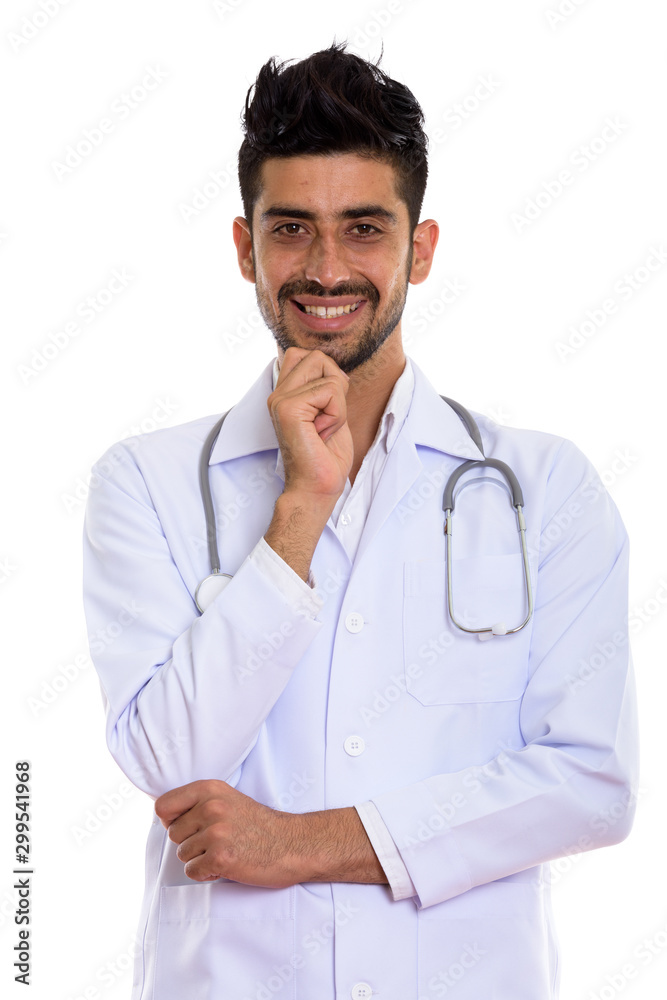 Portrait of young handsome bearded Persian man doctor Portrait of young handsome bearded Persian man doctor