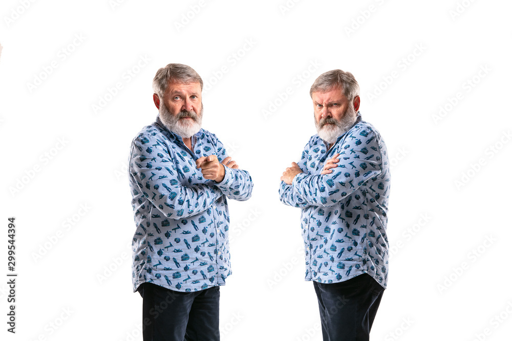 Senior man arguing with himself on white studio background. Concept of human emotions, expression, mental issues, internal conflict, split personality. Half-length portrait. Negative space. Pointing. Senior man arguing with himself on white studio background. Concept of human emotions, expression, mental issues, internal conflict, split personality. Half-length portrait. Negative space. Pointing.