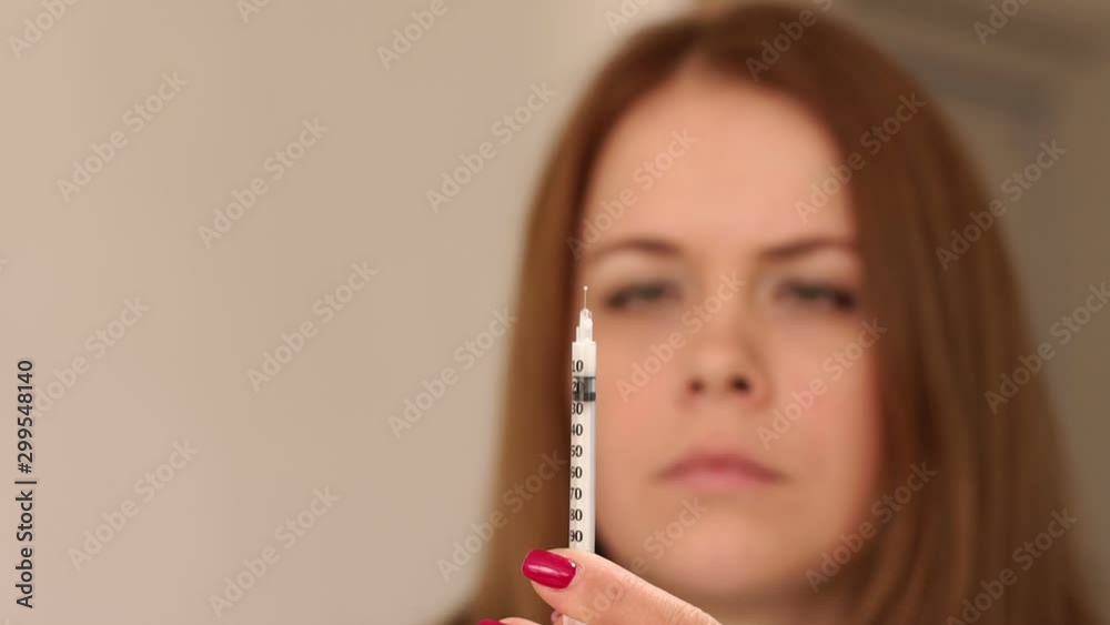 Closeup of the girl gaining the desired dose of prolonged action