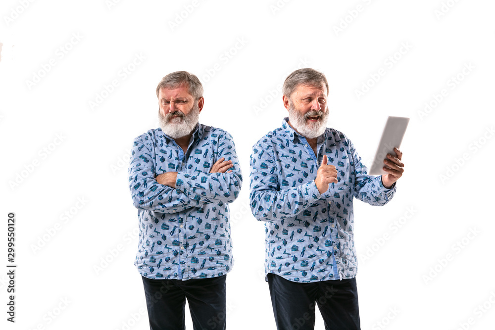 Try to be your best friend. Senior man talking with himself on white studio background. Concept of human emotions, expression, mental issues, internal conflict, split personality. Cinema, vlog. Try to be your best friend. Senior man talking with himself on white studio background. Concept of human emotions, expression, mental issues, internal conflict, split personality. Cinema, vlog.