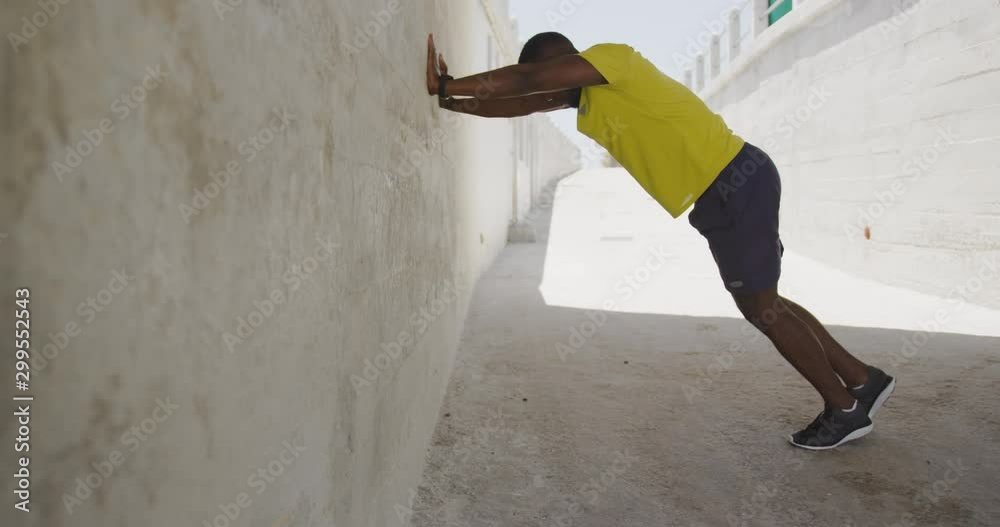 Man exercising in an urban setting Man exercising in an urban setting