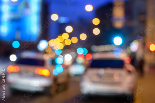 Background, blur, out of focus, bokeh. De-focused Night Street Lights of traffic lights and vehicles.