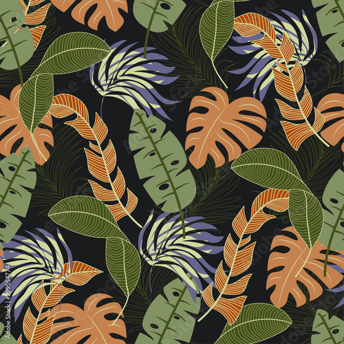 Abstract seamless tropical pattern with bright green and yellow leaves and plants on black background. Seamless pattern with colorful leaves and plants. Tropical botanical.