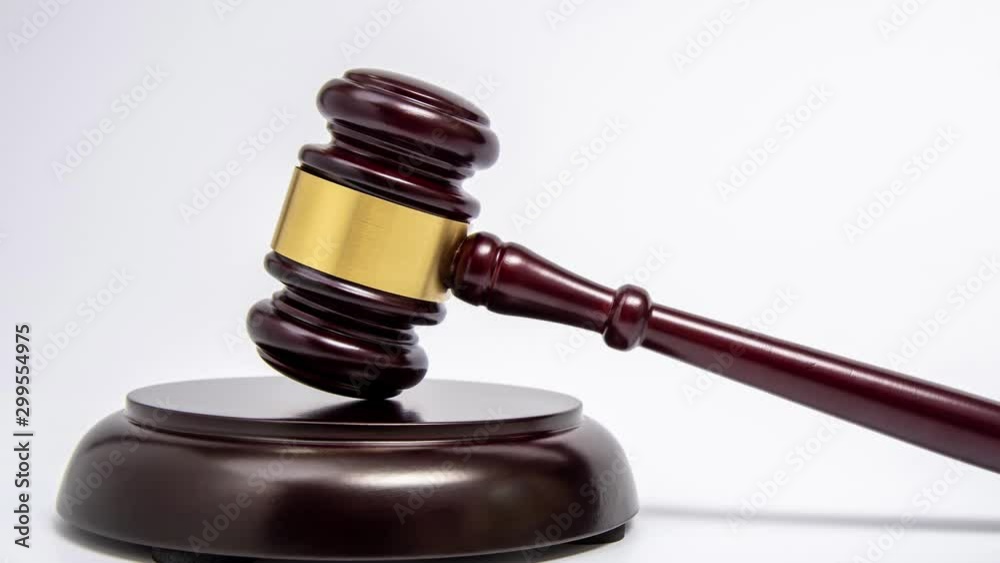 Zoom out. A wooden judge gavel on white background. Zoom out. A wooden judge gavel on white background.