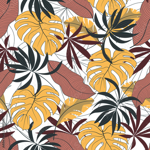Fashionable seamless tropical pattern with bright yellow and red leaves and plants on white background. Jungle leaf seamless vector floral pattern background. Exotic wallpaper. © EltaMax99
