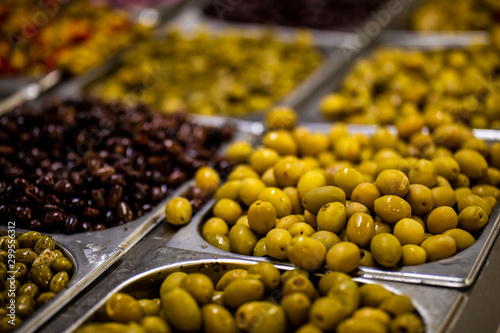 Different Olives are in steel Marmite