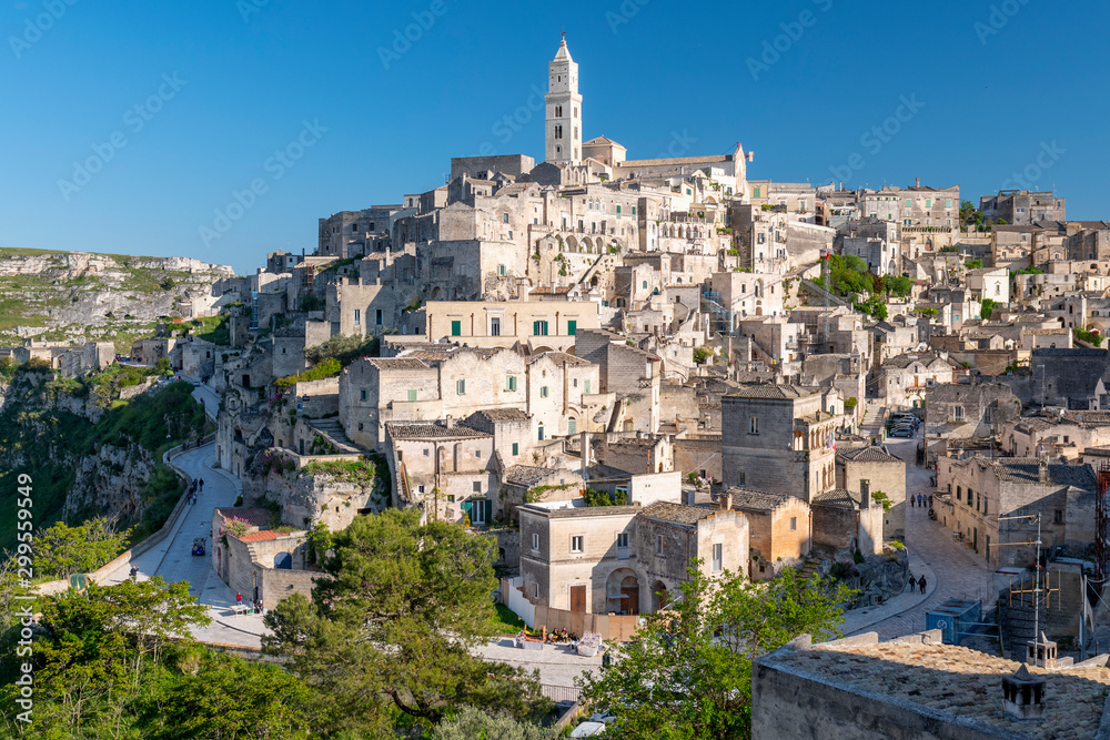 View of the ancient town and historical center called Sassi, perched on rocks on top of hill, Matera, Basilicata, Italy.