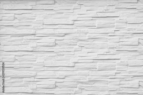 pattern of white slate stone wall surface gray toned using as background