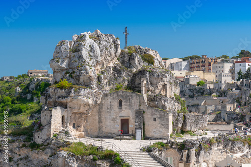 View of the church of Madonna de Idris ( Chiesa Rupestre di Santa Maria di Idris ) in the rock. Cave church in Sassi old town. Matera, Italy.