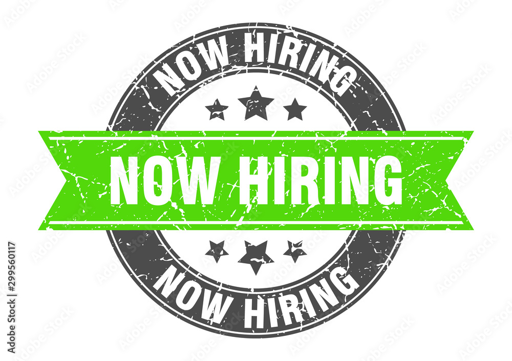 Obraz premium now hiring round stamp with green ribbon. now hiring