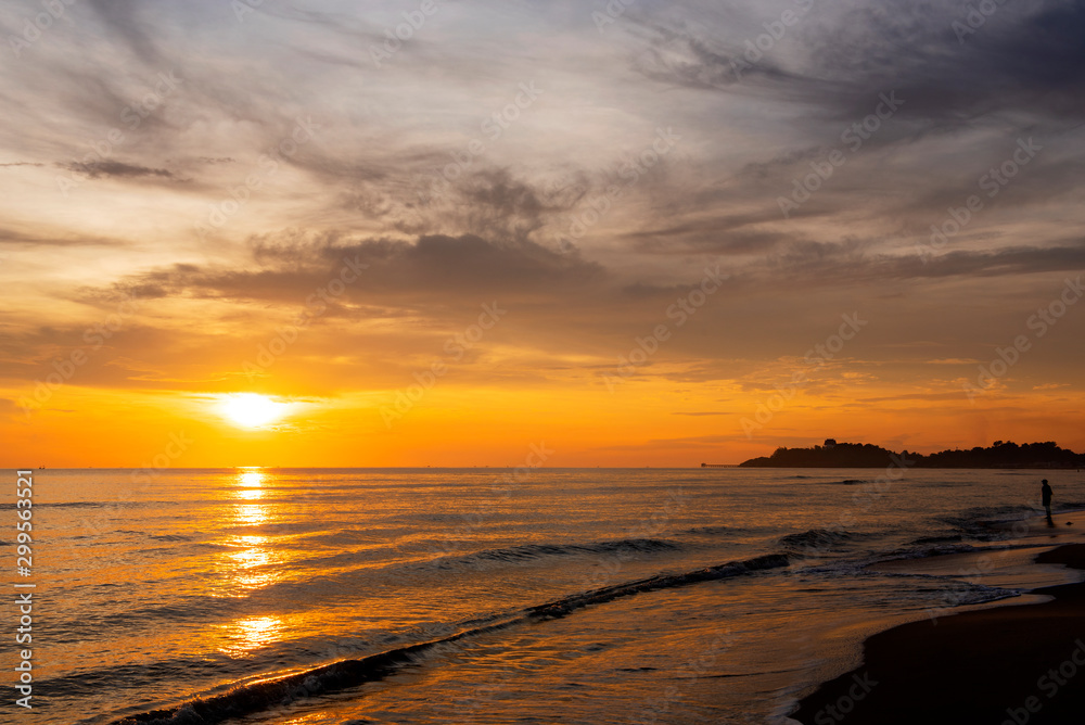 Fototapeta premium Sky and clouds with a beautiful light morning in the sea for travel on holidays, Songkhla Thailand 