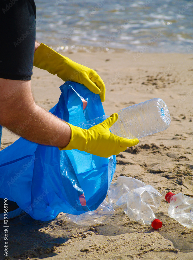 Cleaning the beach of plastic, save the ocean Cleaning the beach of plastic, save the ocean