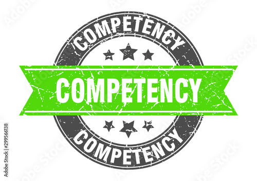competency round stamp with green ribbon. competency
