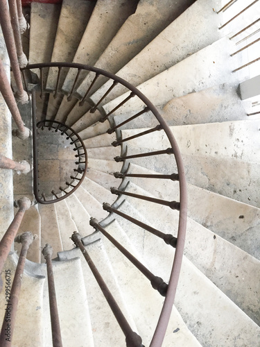 Fényképezés white circular staircase spiral stairs in old house