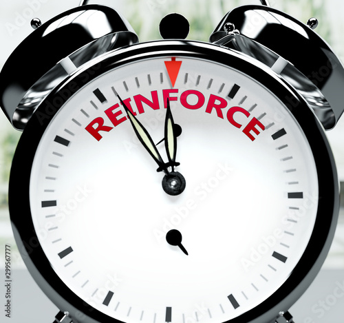 Valokuva Reinforce soon, almost there, in short time - a clock symbolizes a reminder that