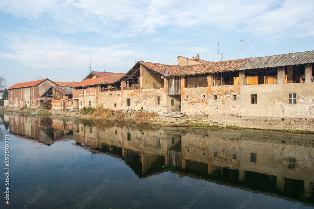 The Naviglio canal that flows into the northern italian plain
