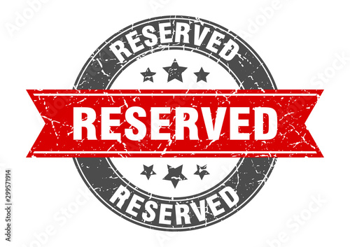 reserved round stamp with red ribbon. reserved