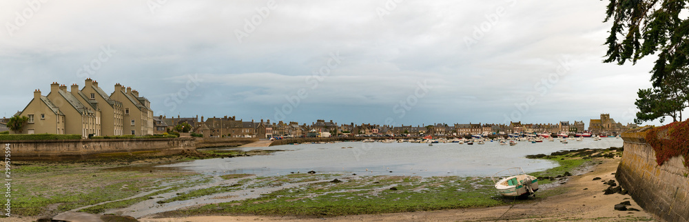 panorama view of Barfleur and the harbor at low tide in the evening